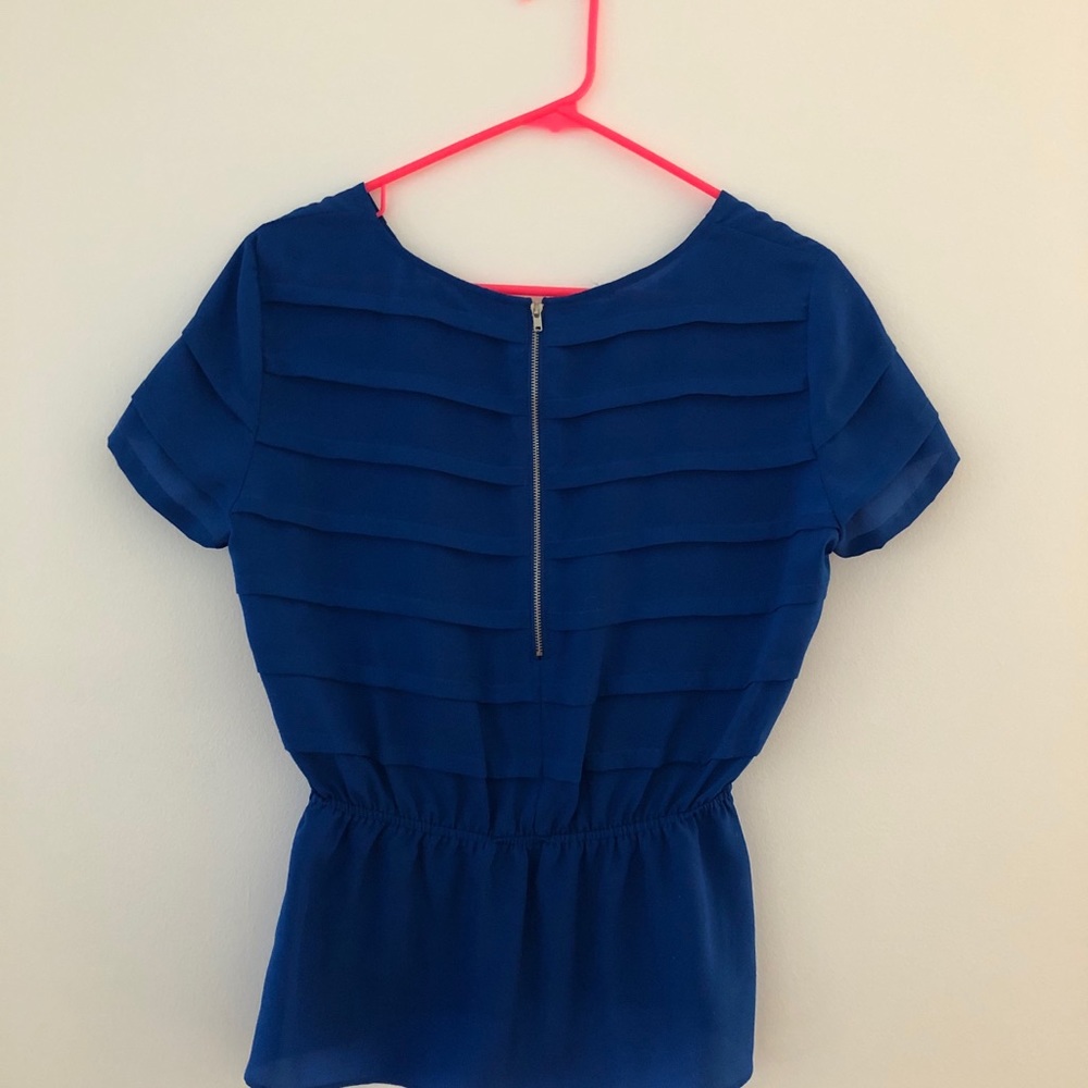 Women’s peplum top size small